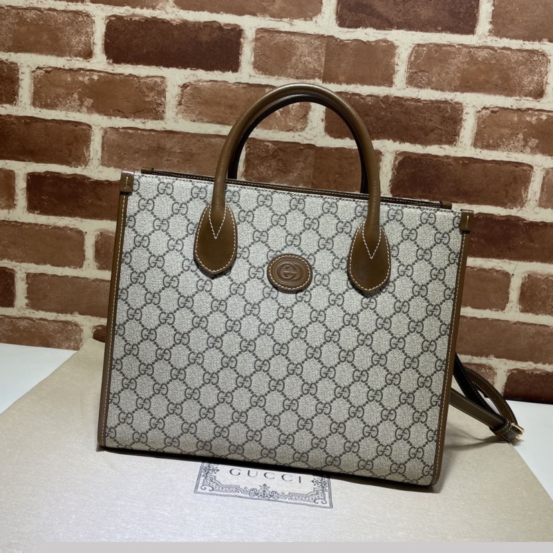 G*u*i shopping bags
